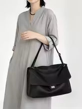 Work to dinner with one bag: soft leather, 3 ways to wear it.