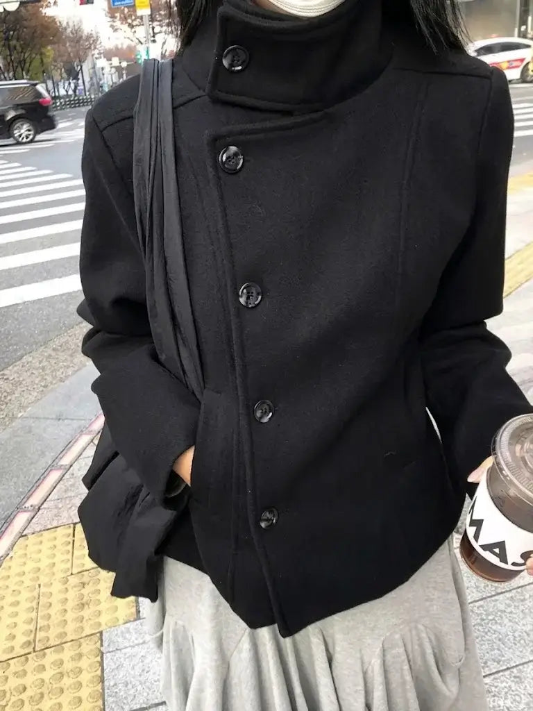 The Coat That Turns Any Simple Outfit Into a Complete, Sophisticated Look in Seconds